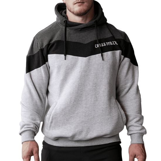Comfortabele Crossmaxx® hoodie in tri-kleur, perfect voor training en dagelijks gebruik. Verkrijgbaar in maten S t/m XXL, gemaakt van 65% katoen en 35% polyester.